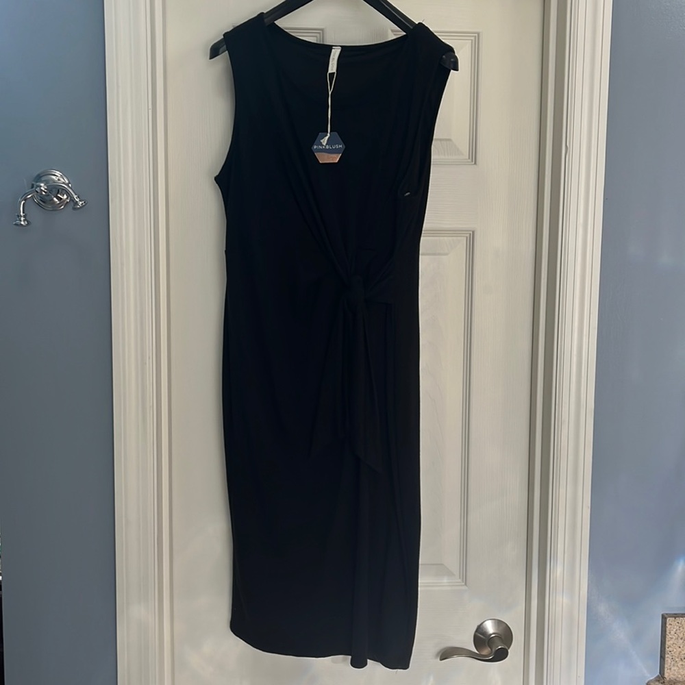 Pink blush maternity wrap dress. NWT never worn.